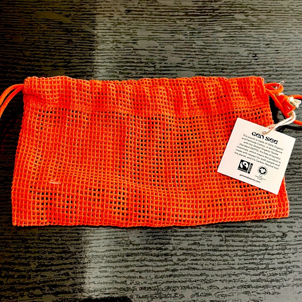 Organic cotton pouch in orange. NWT.